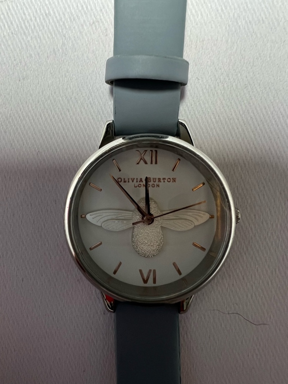 Olivia Burton Watch With 30mm Silver Face With 3D
Silver Bee & Sage Green Band